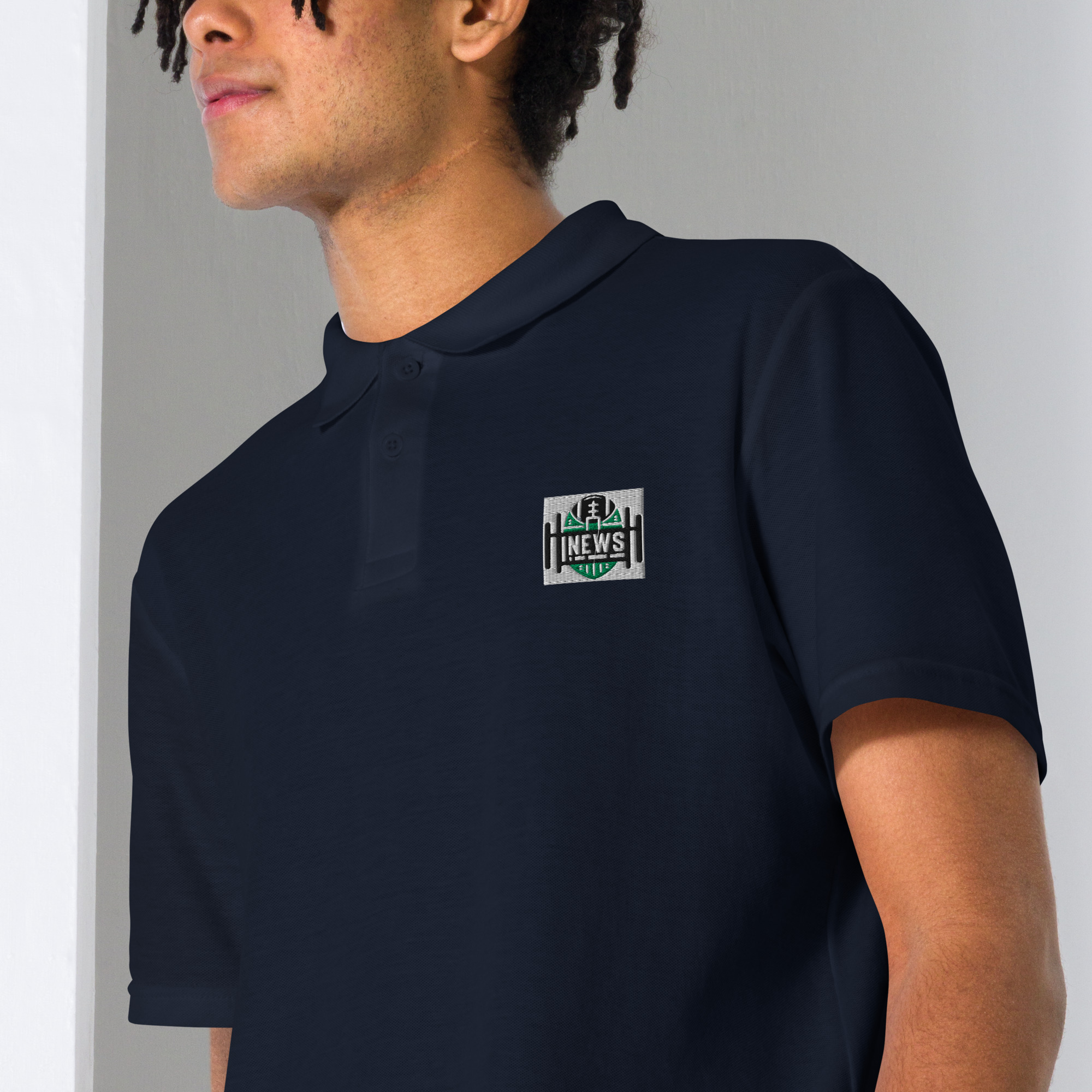 UFL News Hub polo shirt - Image 6