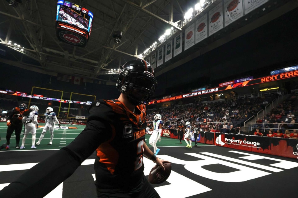Firebirds QB Sam Castronova celebrates his rushing TD with a quick selfie